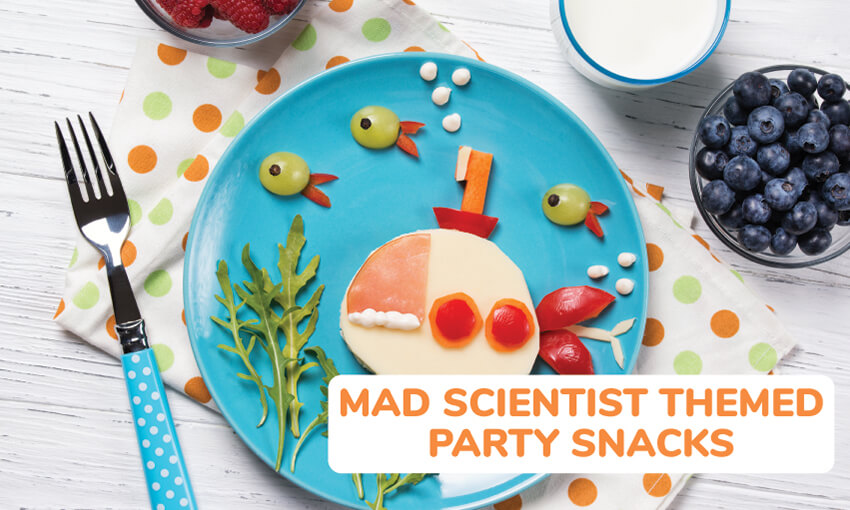 A picture of decorative food in the shape of fish and seaweed on a blue plate. Text reads mad scientist themed party snacks. 