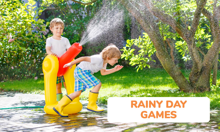 two kids playing with water cannon