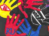 A picture of an art project with blue, red, and black hands with team logos on them. Made from markers.