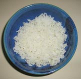 A picture of a bowl of white rice. 