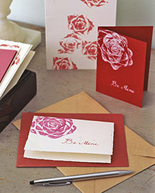 A picture of valentines cards with cabbage ink designs on the cards. When you dip the cabbage in ink and press it on the card, it looks like a beautiful flower. 