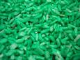 A picture of green colored rice. 