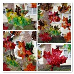 A picture of leaf stained glass. Four different images. Red, green, and orange leaf designs on windows. 