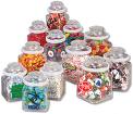 An image of about 10 glass jars each filled with different amounts of things to play a guessing game of what's inside. 