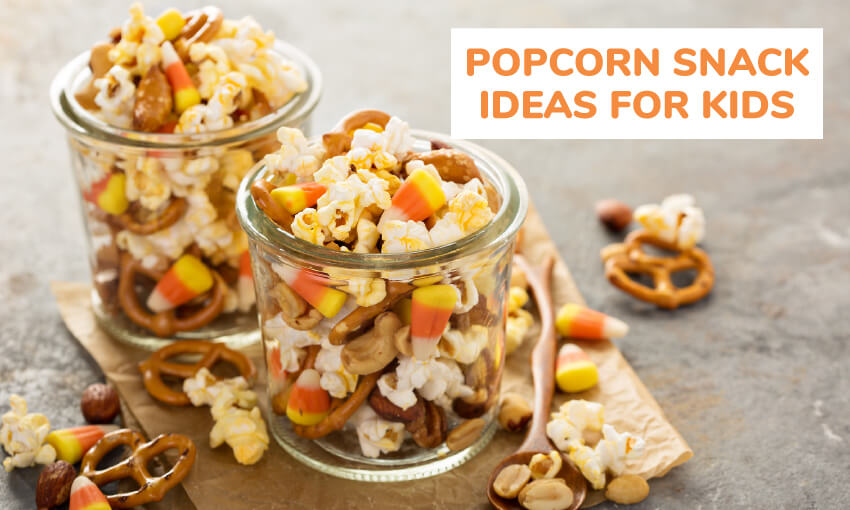 A picture of two glasses of popcorn trailmix snack. Text reading popcorn snack ideas for kids. 