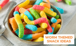 A picture of a bowl filled with colorful sour gummy worms. Text reads worm themed snack ideas. 