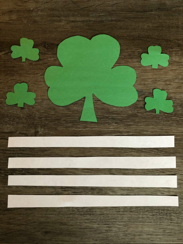 The cutout pieces for making "shamrock people" craft. 