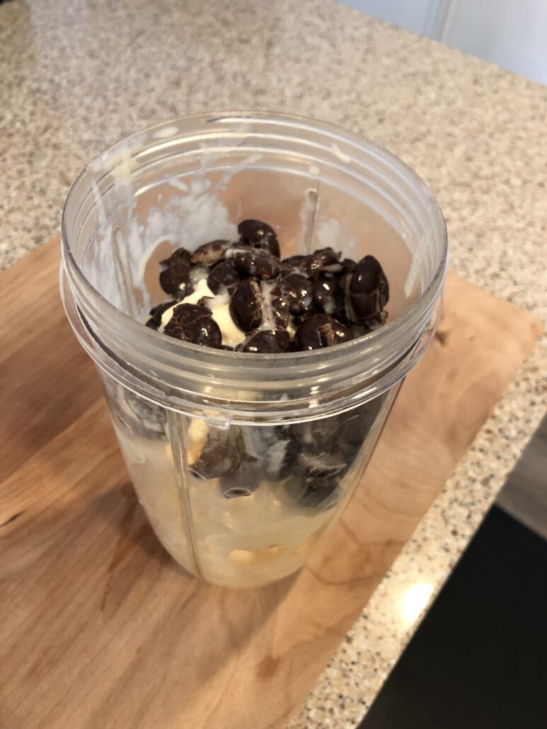 Peppermint candy shake inside bender prior to mixing. 