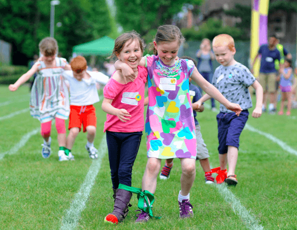 kids playing three-legged race