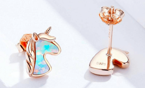 A pair of unicorn earrings 