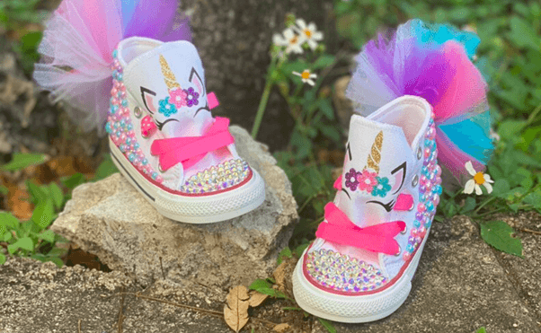 pair of custom-made unicorn sneakers