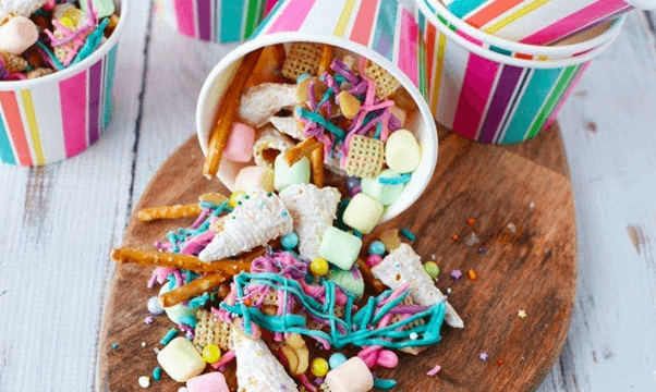 unicorn party snack mix with cereals, pretzels, and other colorful sweets