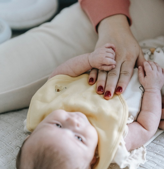 mom giving a baby a message